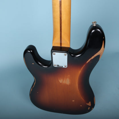Close-up of the four-bolt neck plate and upper rear contour.