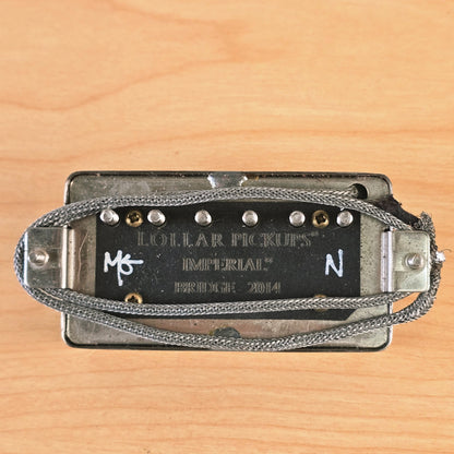 Underside of the 2014 Lollar Imperial bridge pickup showing wire leads and engraving.