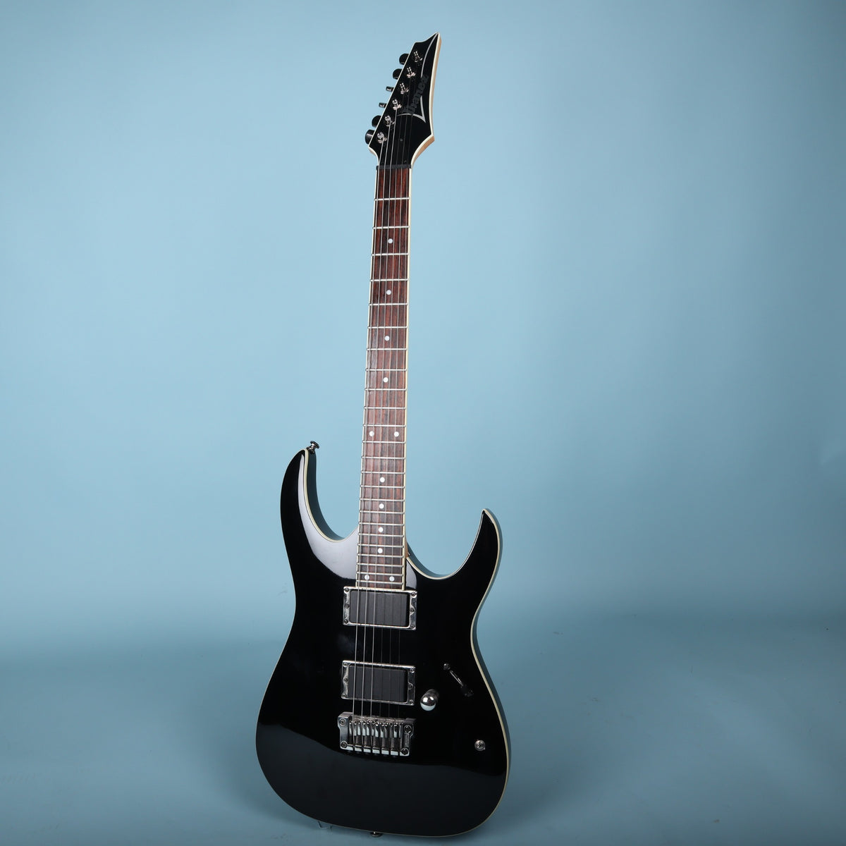 Full front view of Ibanez RGA42 electric guitar in gloss black finish