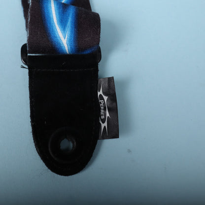 Close-up of the black leather strap end with sewn-on Perri's logo tag