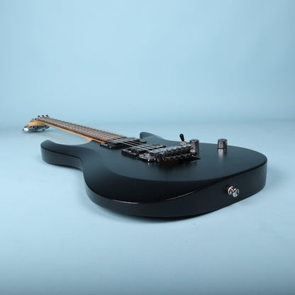 Bottom edge view of the Schecter C-6 Deluxe FR body and strap button.