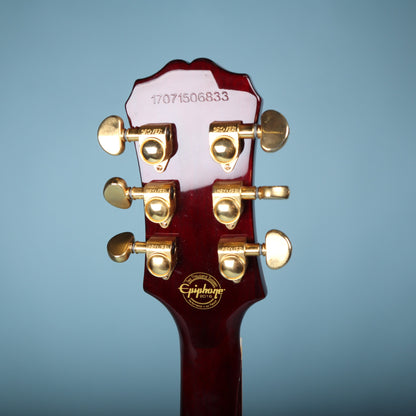 Back of headstock showing gold Grover tuners and stamped serial number 17071506833