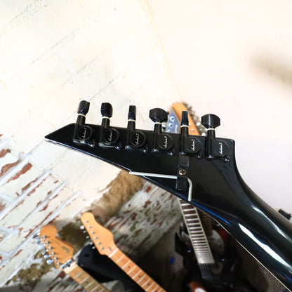 Rear view of the headstock showing Jackson tuning machines and mounted hex wrench holder