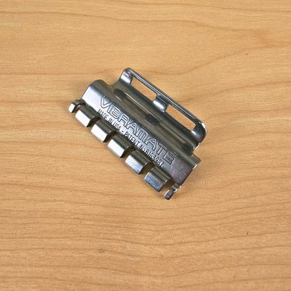 High-angle view of the Vibramate Spoiler positioned on a wood tabletop.