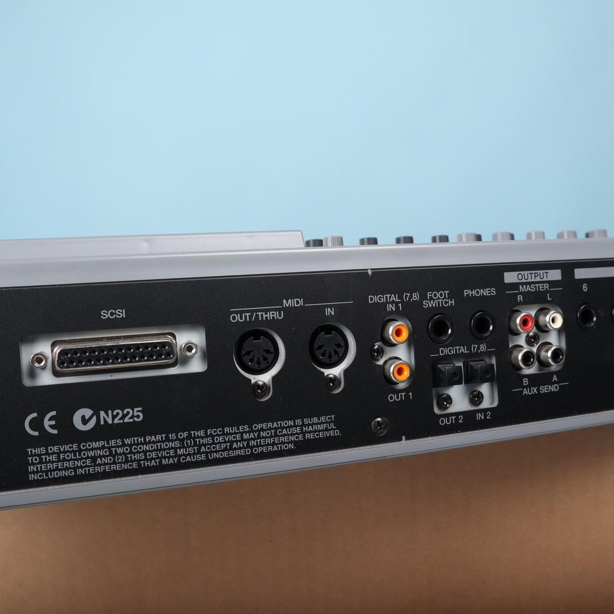 Close-up of SCSI connector, MIDI ports, optical digital connections, and foot switch jack on Roland VS-880EX.