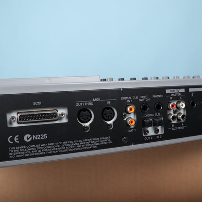 Close-up of SCSI connector, MIDI ports, optical digital connections, and foot switch jack on Roland VS-880EX.