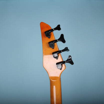 Rear of the headstock showing four black Carvin tuners in line.