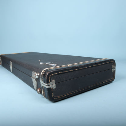Opposite side end view of closed Fender guitar case