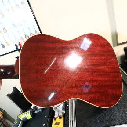 Mahogany back of the Gibson B-25-12 showing rich wood grain and wear.