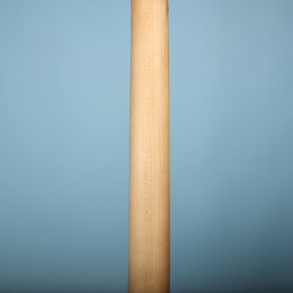 Rear view of smooth maple neck displaying light wood grain.