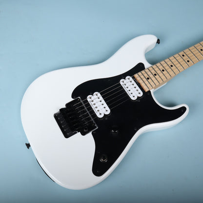 Overhead view of front body highlighting black pickguard and hardware.