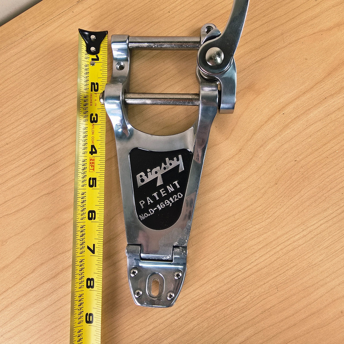 Overall length of the tailpiece measured with a tape measure at approximately 8 1/2 inches.