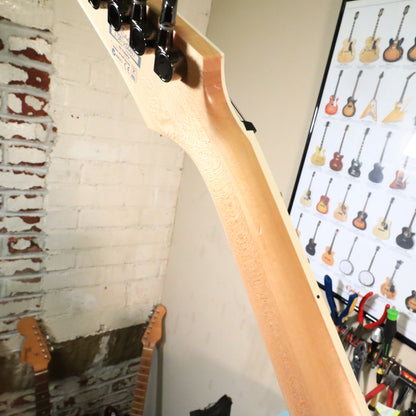 Angled view of neck back near headstock transition