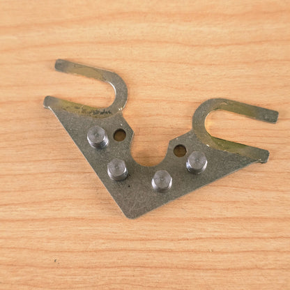 Top view showing roller alignment, open mounting forks, and etched DP logo