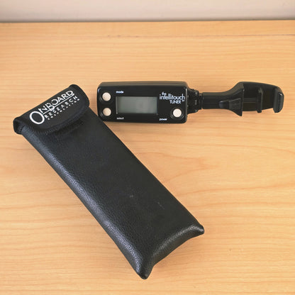 OnBoard Research Corporation The Intellitouch Tuner alongside its black storage pouch.