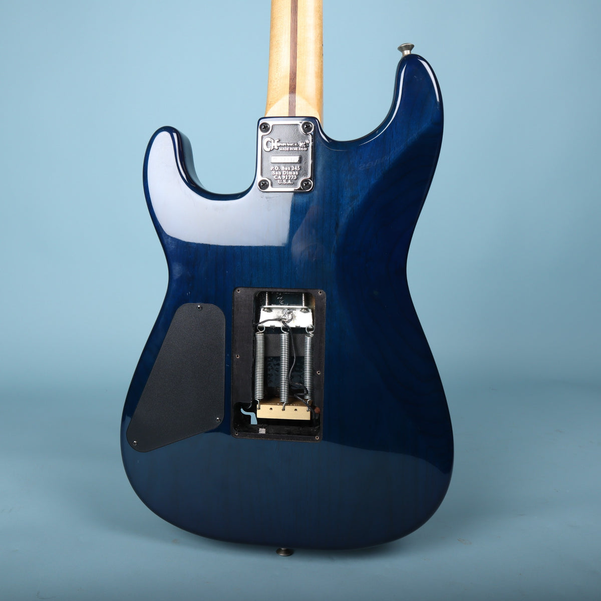 Rear body view of Charvel electric guitar showing neck plate