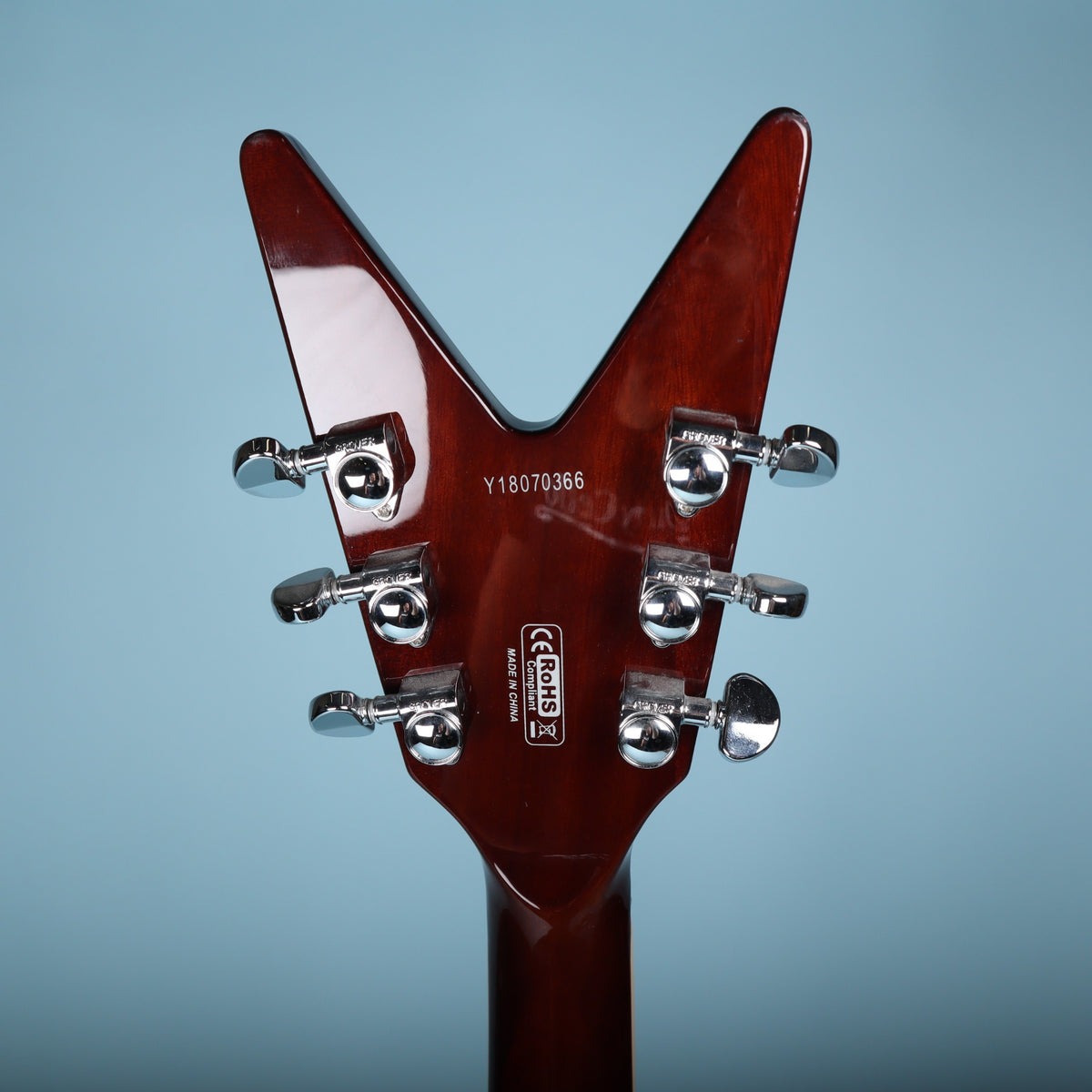 Back of Dean ML headstock showing Grover tuners, serial number Y18070366, and Made in China marking