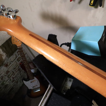 Rear view of maple neck shaft showing dark skunk stripe.