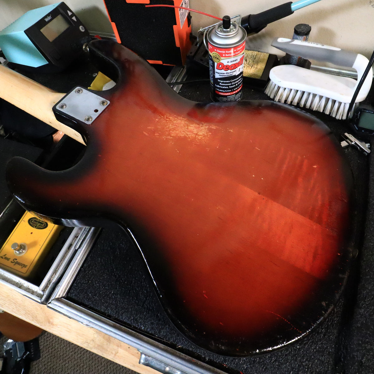 Back of the body on the workbench showing finish checking and wear.