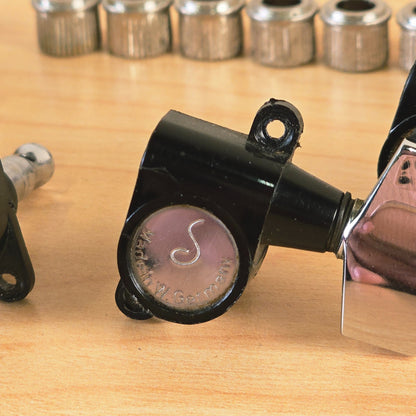 Detailed view of Schaller housing logo and West German marking