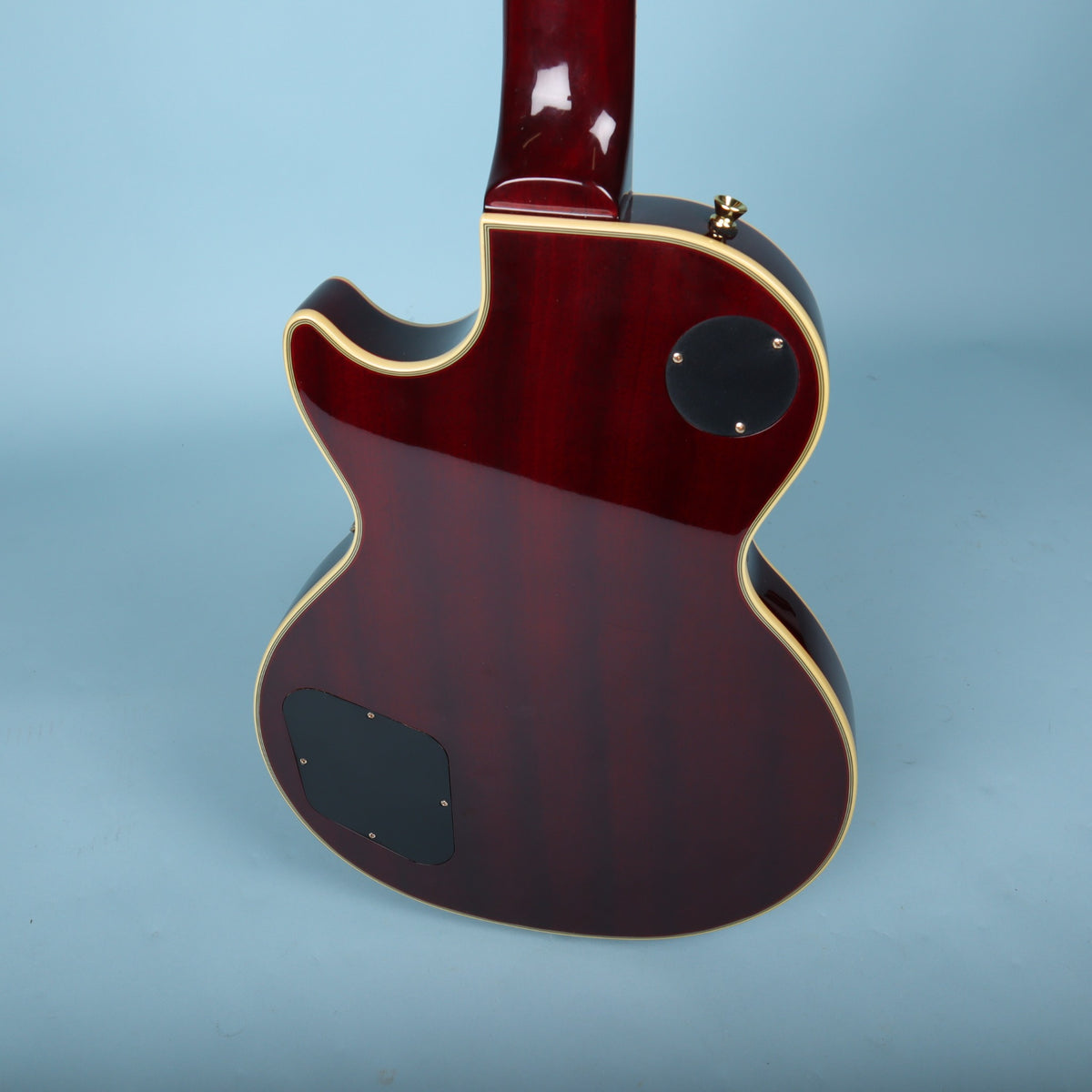 Angled back view of Epiphone Les Paul Custom body and neck heel