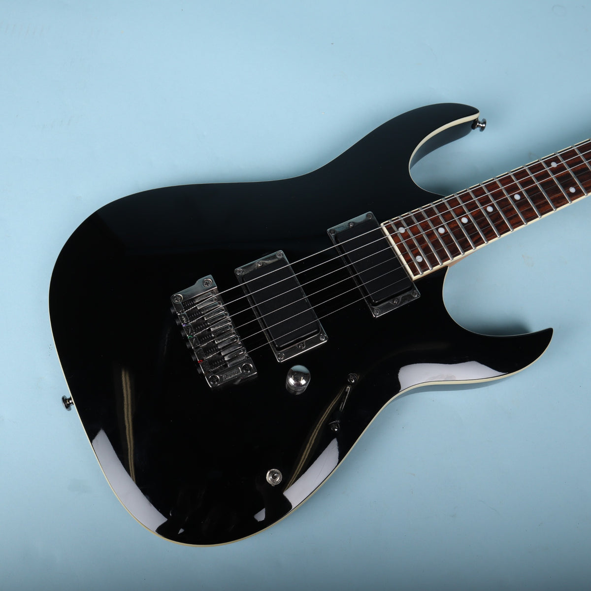 Front body angle view showing Ibanez RGA42 gloss black finish