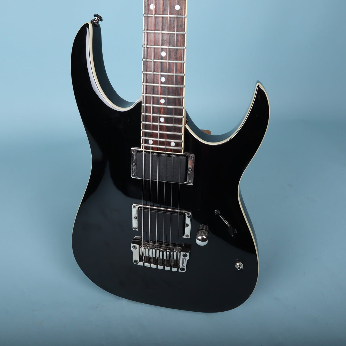 Front angle view of black Ibanez RGA42 body showing pickups and bridge