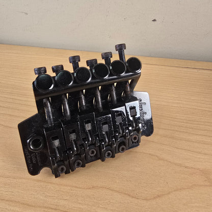 Angled top view showing fine tuners and saddles