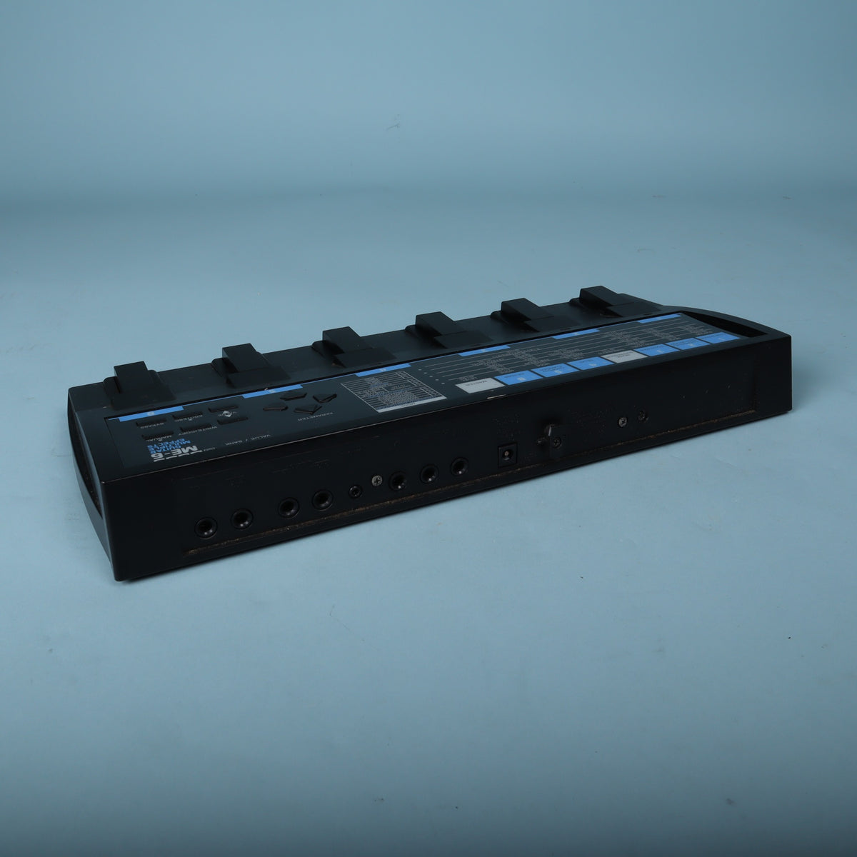 Rear connection jacks of the Boss ME-6 guitar effects unit