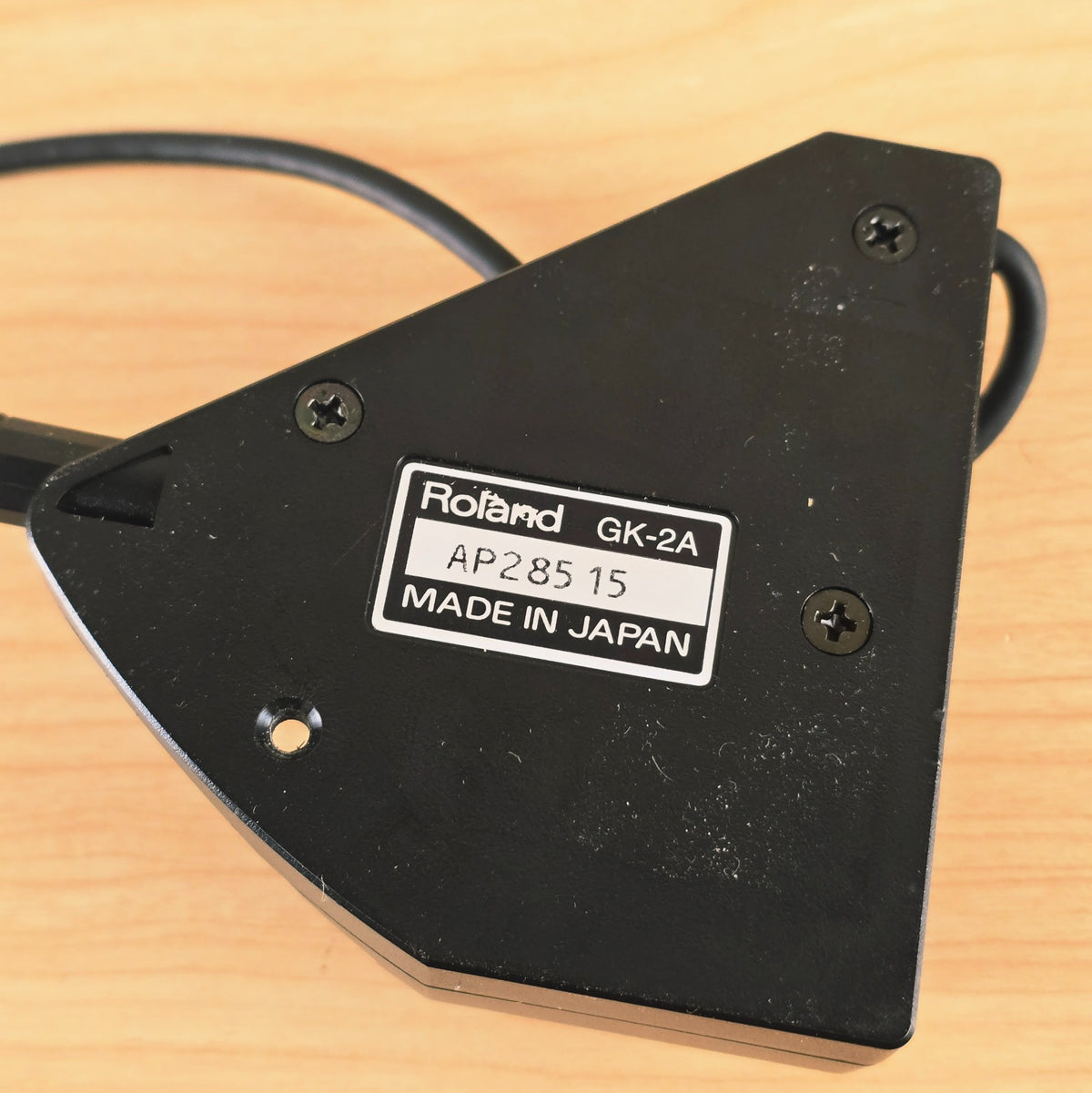 Close-up of Roland GK-2A rear label with serial number AP28515 Made in Japan.