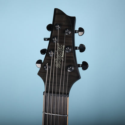 Front of the Schecter Diamond Series 7-string headstock and nut
