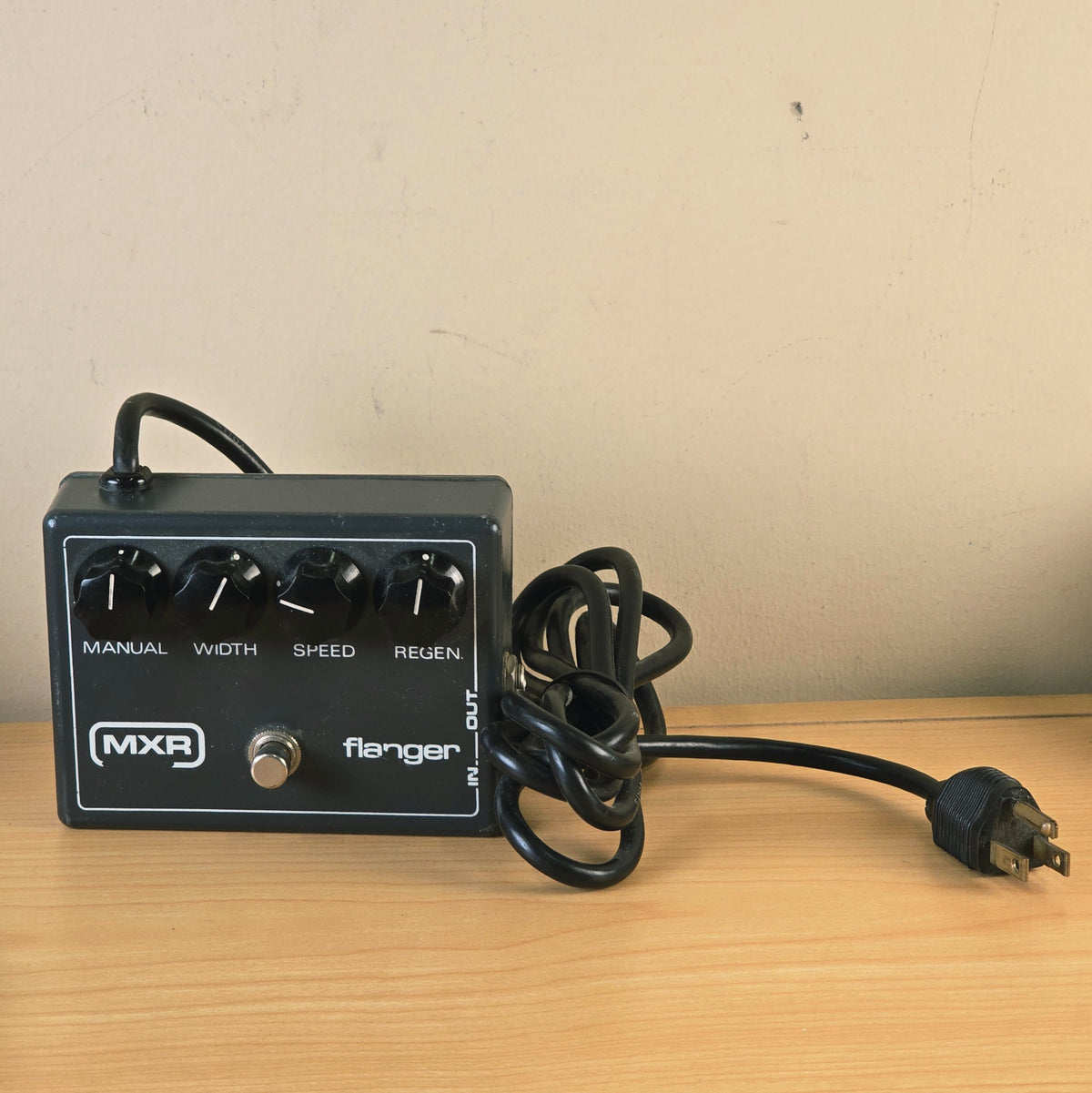 Front view of MXR Flanger Model 117 pedal with attached power cord.