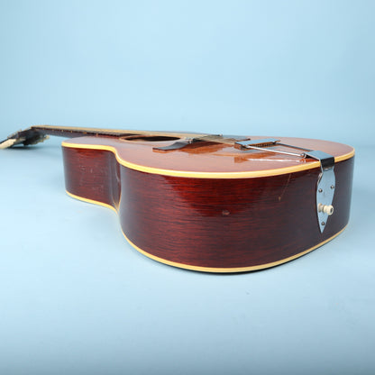 Treble-side profile of the mahogany body of a Gibson B-25-12.