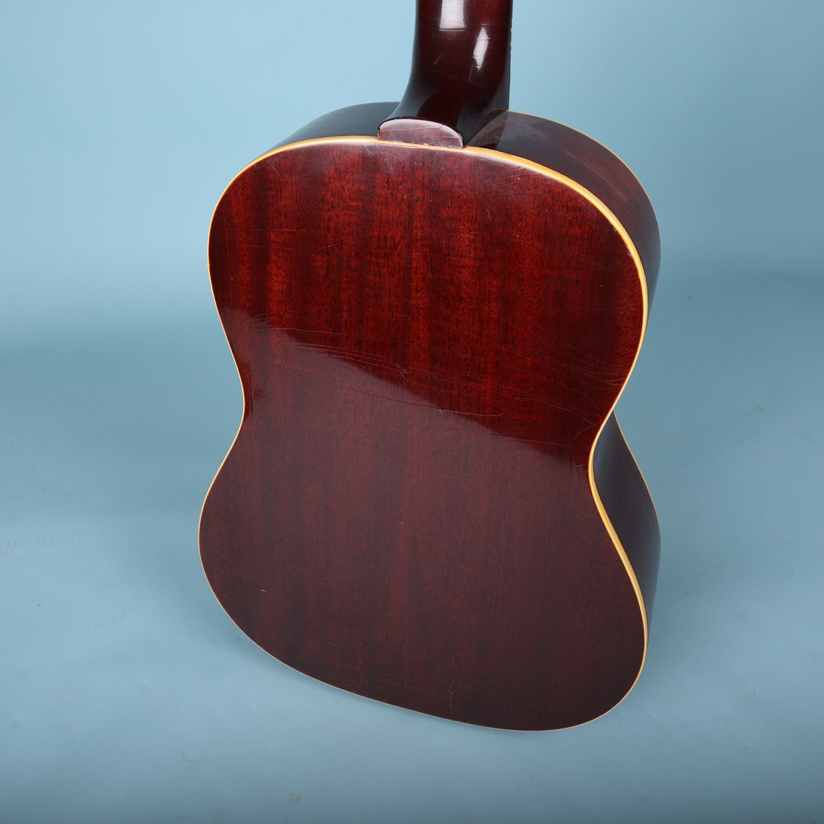 Close-up of the mahogany back of the Gibson B-25-12 body.
