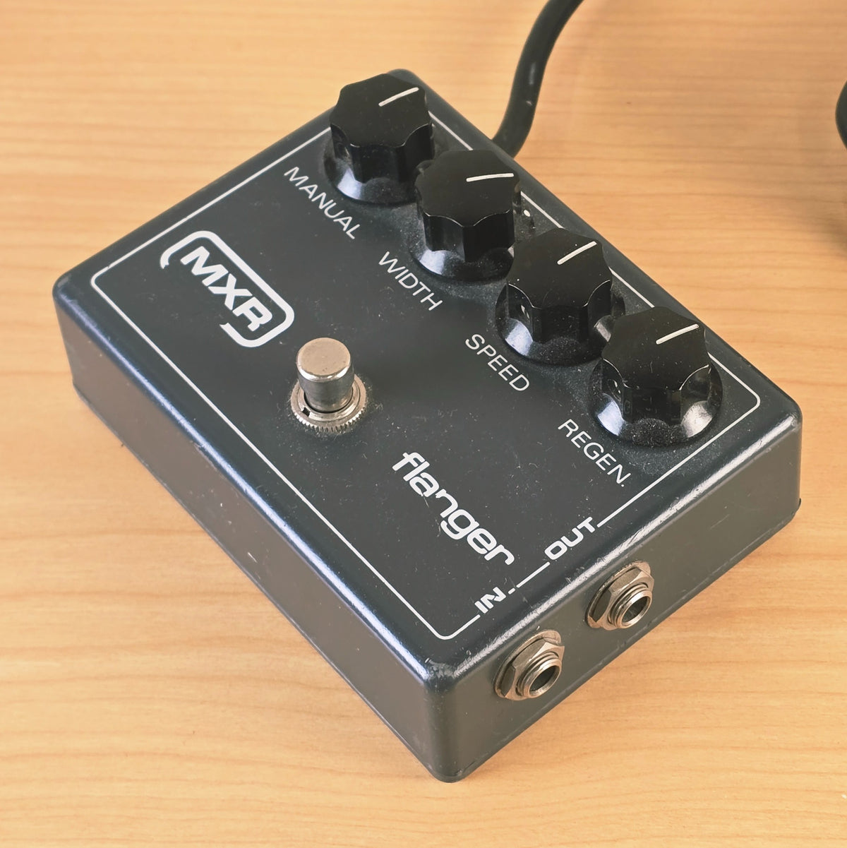 Side view showing 1/4-inch input and output jacks on MXR Flanger.