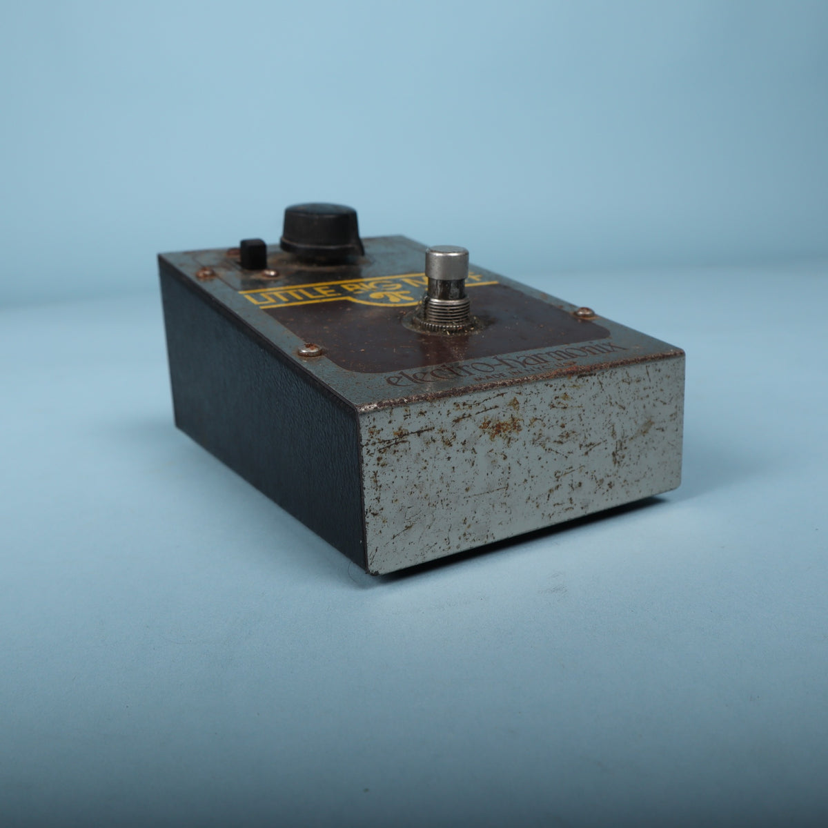 Bottom-front edge view of the metal chassis.