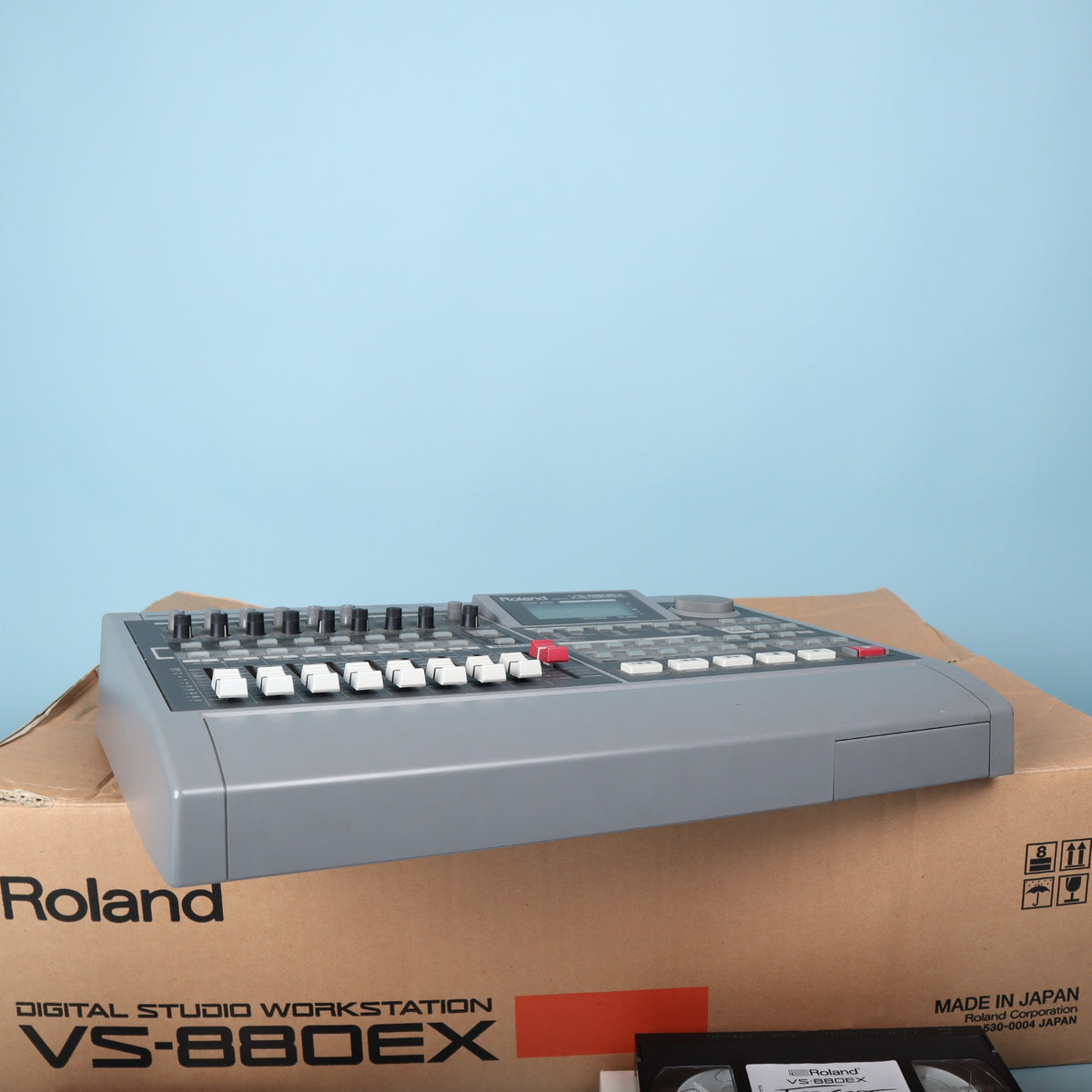 Front-side perspective of Roland VS-880EX digital studio workstation control surface.