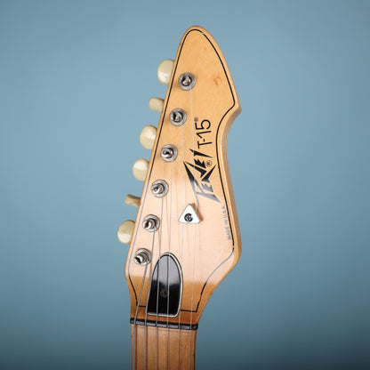 Front face of the Peavey T-15 headstock showing logo and Made in USA text.