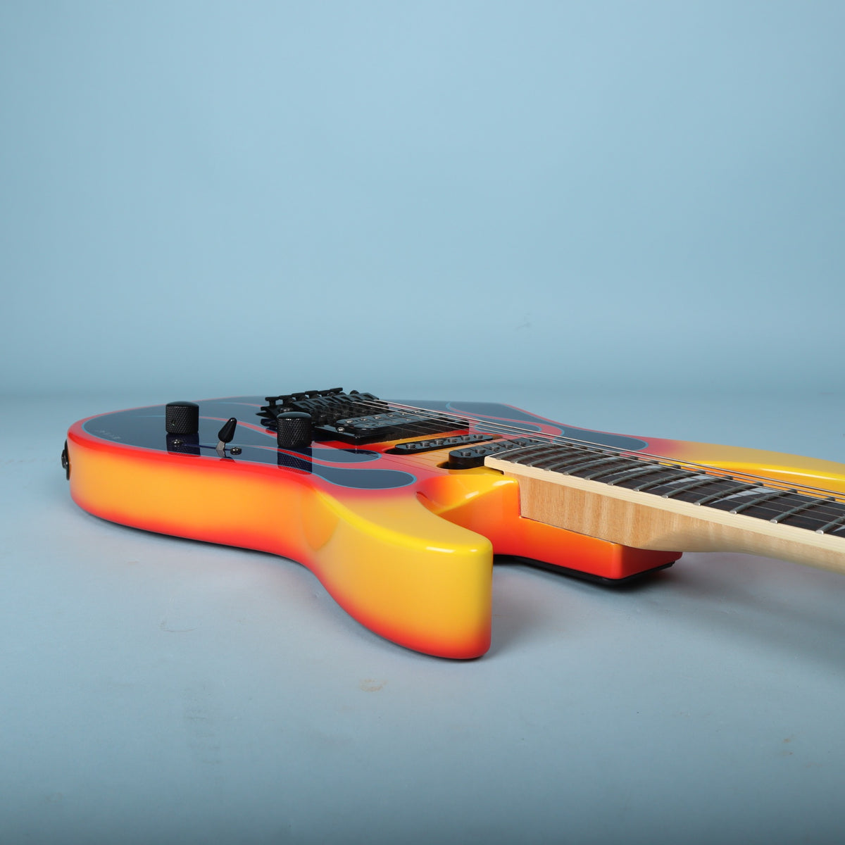 Treble side horn profile showing edge finish and neck joint area