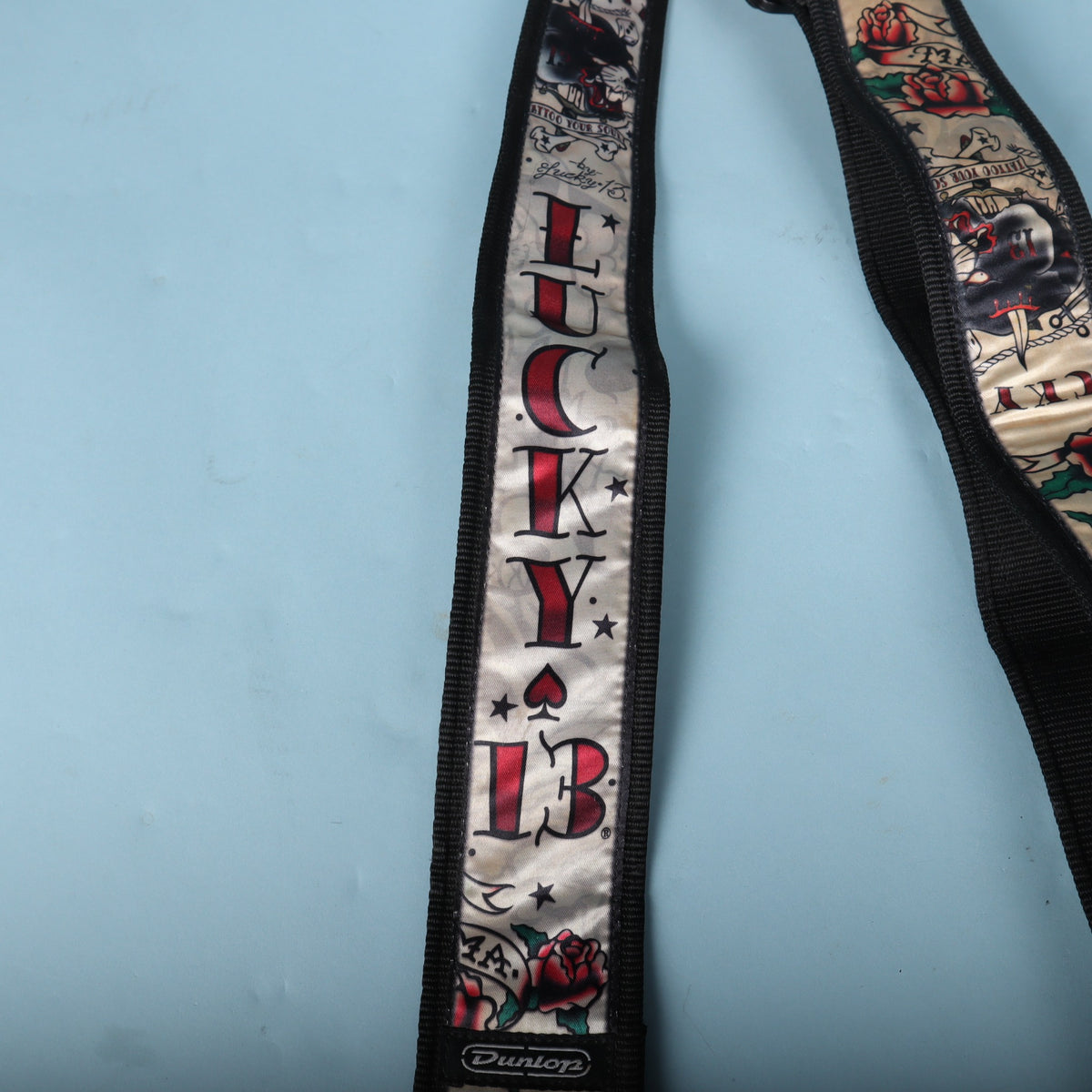 Detailed view of the Lucky 13 lettering and card suit graphics