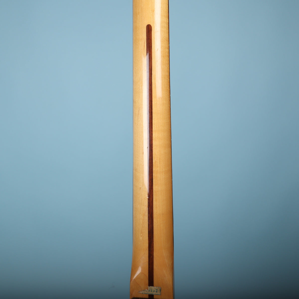Rear view of the maple neck featuring skunk stripe insertion.