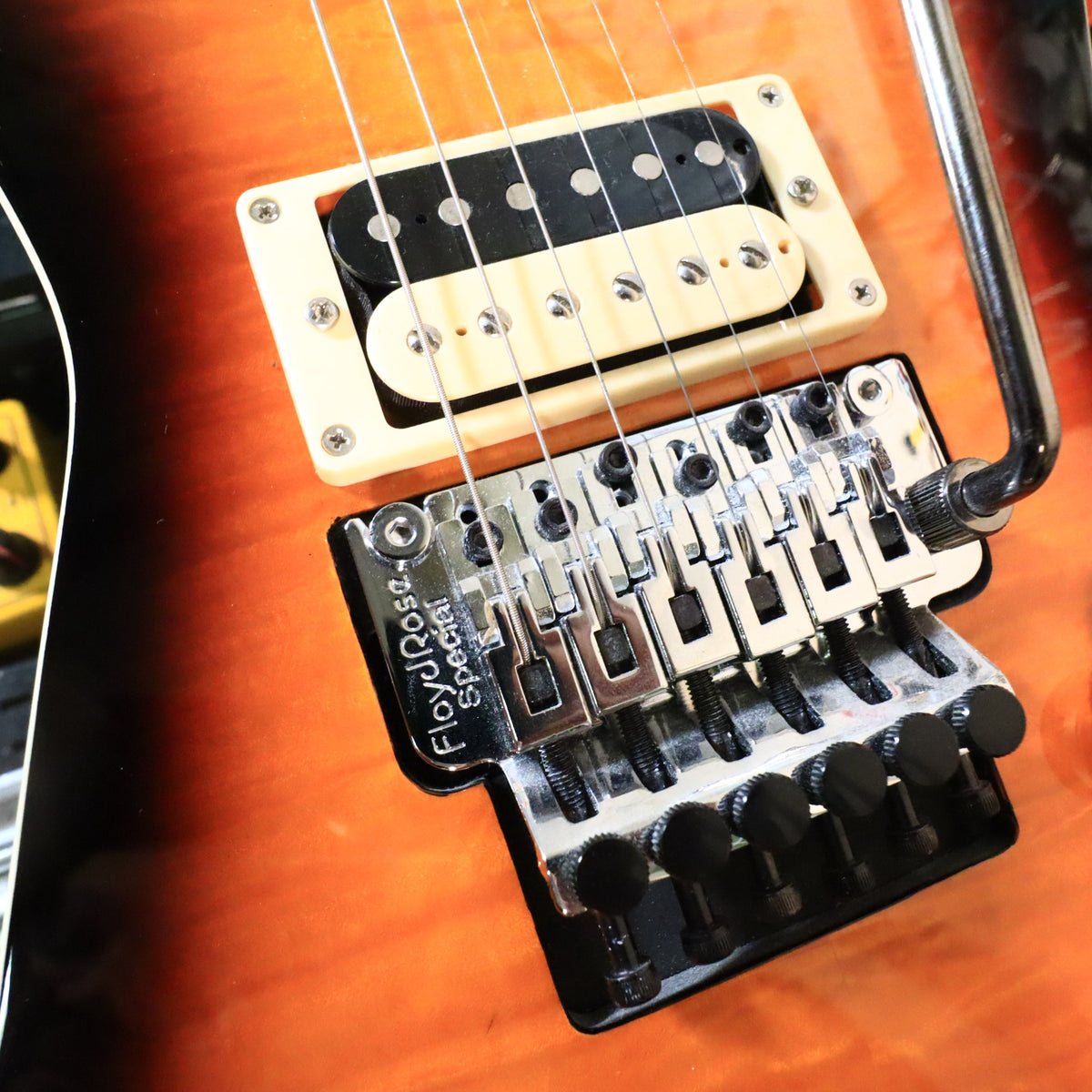 Close-up of Floyd Rose Special bridge and bridge humbucker pickup on Dean ML