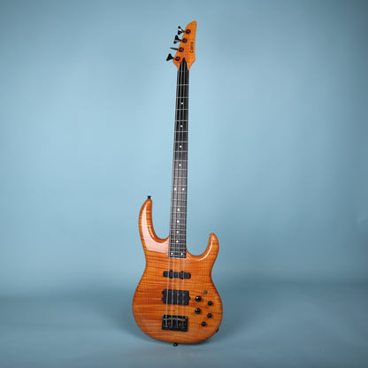 Full-length front view of the Carvin LB70 4-string bass against a blue background.