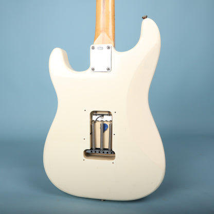 Back of body showing neck plate, tremolo cavity, and strap button