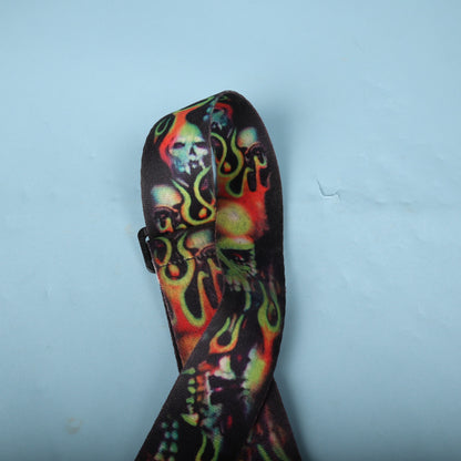 Top loop of the strap showing the vivid skull graphic pattern.