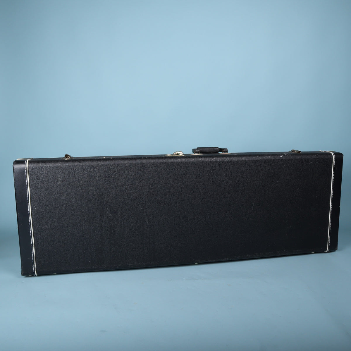 Tobias hardshell bass guitar case full length view on blue background