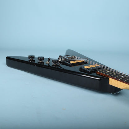 Side profile view of the control knobs and pickup selector switch.