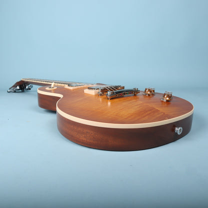 Lower body edge profile showing satin finish and strap button
