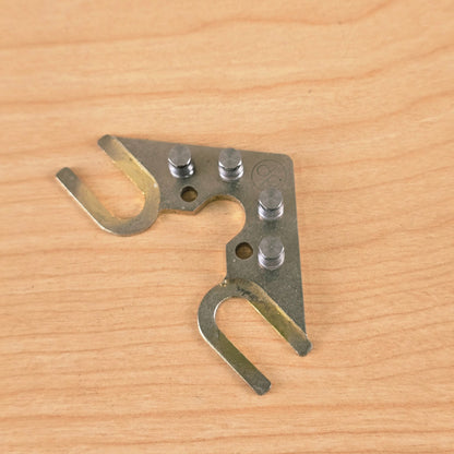Top-down view of String Butler V3 tuning guide in worn gold finish