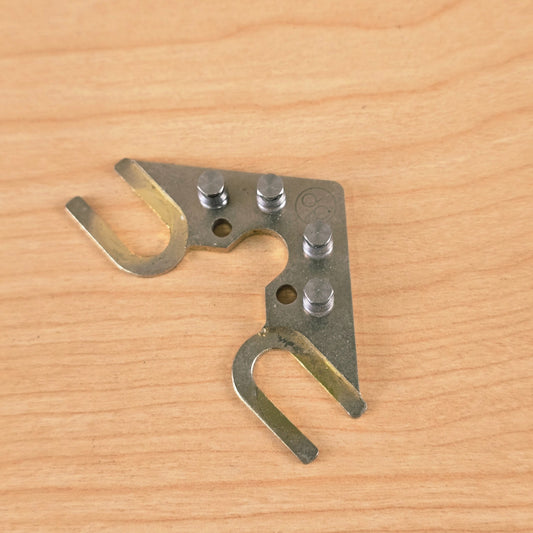 Top-down view of String Butler V3 tuning guide in worn gold finish